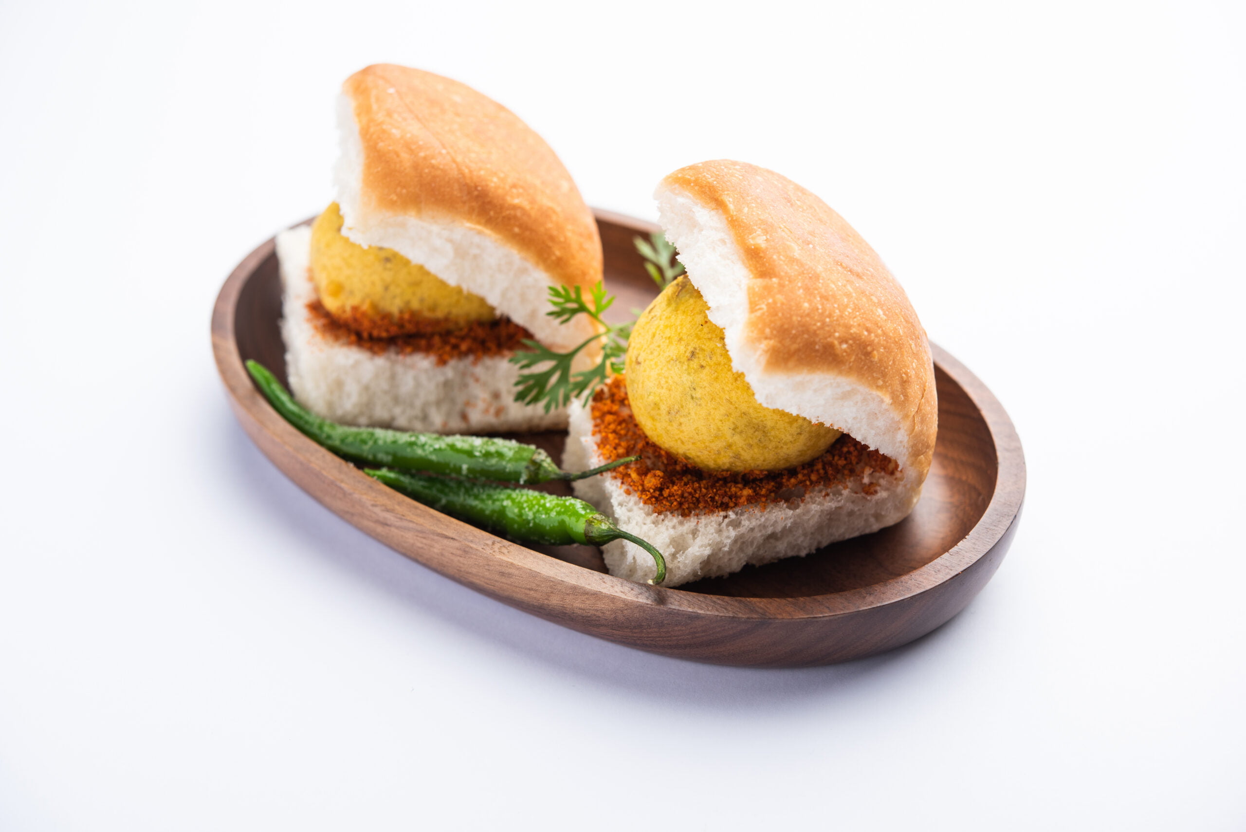 Vada Pav OR Wada Pao is Indian OR Desi Burger, is a roadside fast food dish from Maharashtra. Selective focus